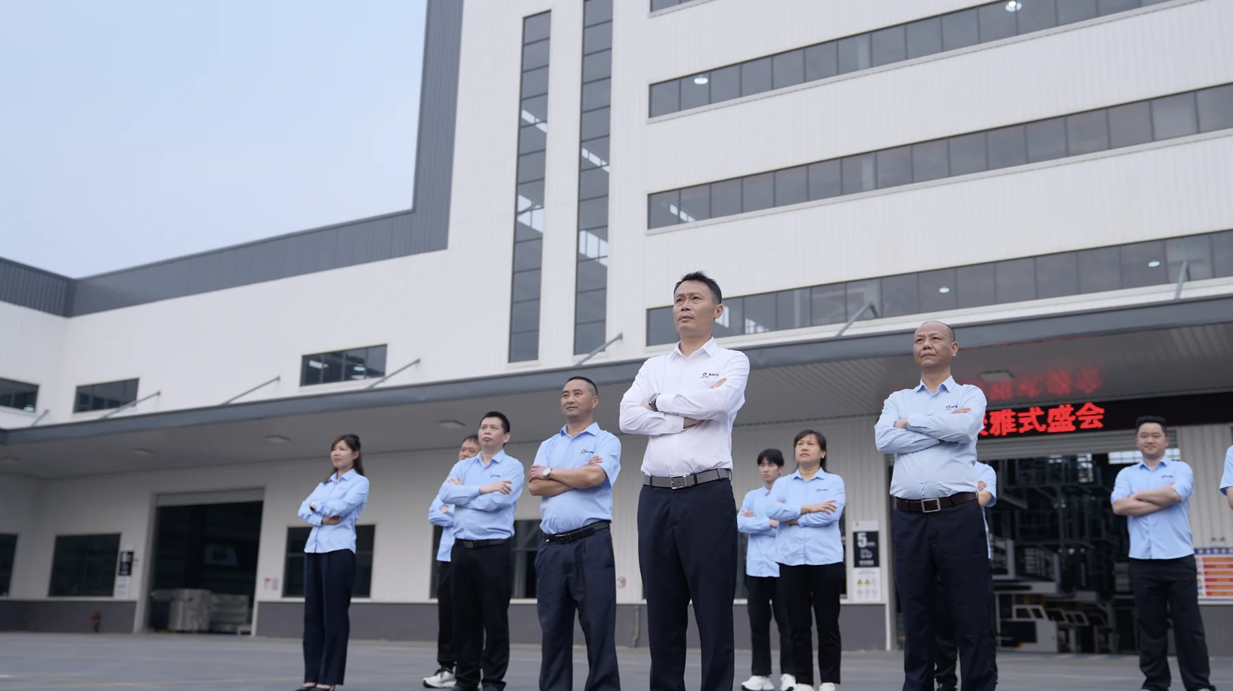 CORSTAR team outside the factory